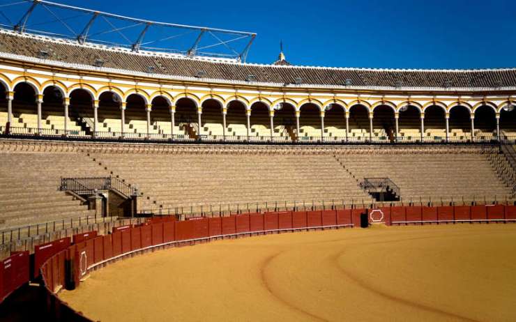 A view of the part of the seating area and a part of the arena of the Bullring in Seville Spain. Image shot 2006. Exact date unknown.